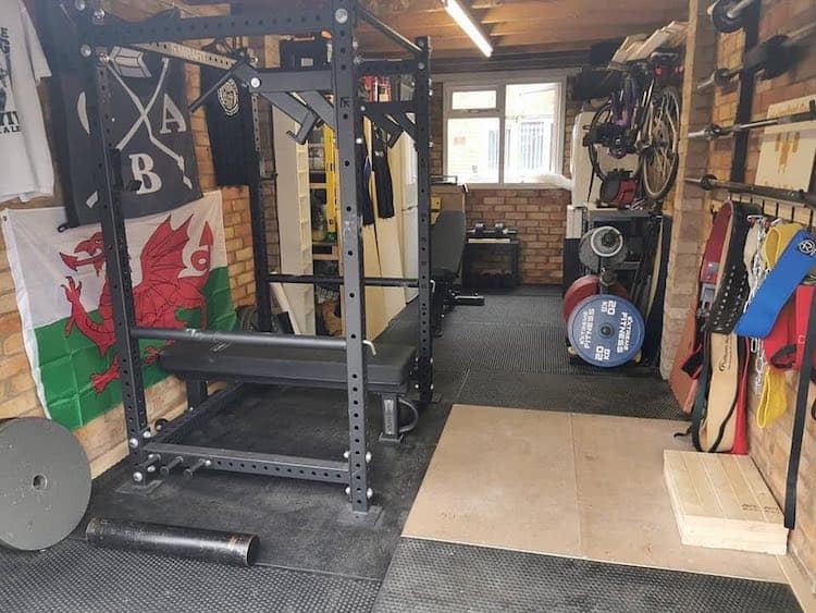 Garage gym rack plates belts wales flag